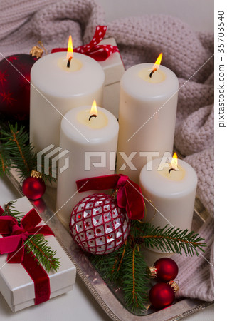 Burning advent candles 35703540