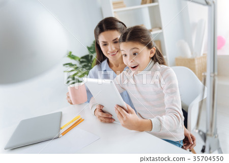 Cute positive girl being surprised 35704550