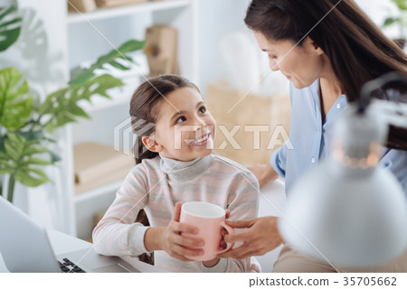 Happy pretty girl having tea 35705662