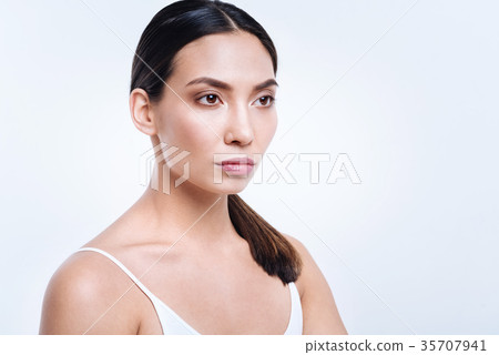 Dark-haired woman with swarthy complexion posing Dark-haired woman with swarthy complexion posing 35707941