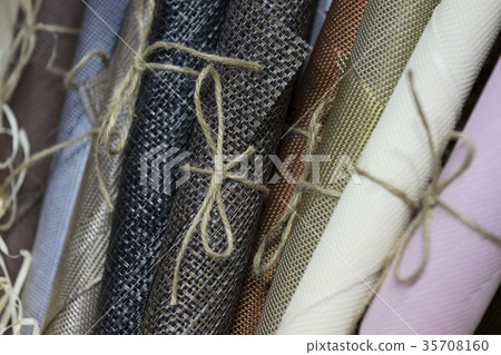 Rolls of wrapping paper binding with rope  35708160