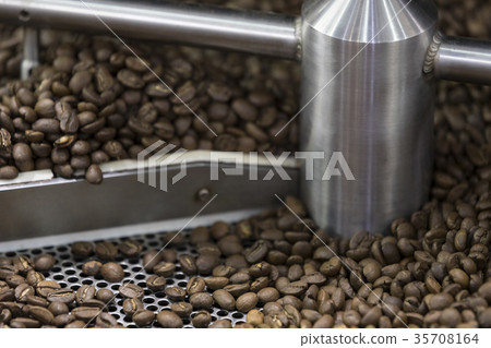 Industrial machine for roasting coffee beans close Industrial machine for roasting coffee beans close 35708164