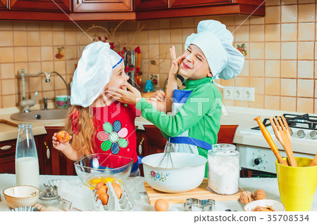 happy family funny kids are preparing the dough happy family funny kids are preparing the dough 35708534