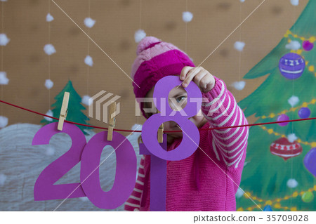 New Year 2018 concept. Beautiful small girl 35709028