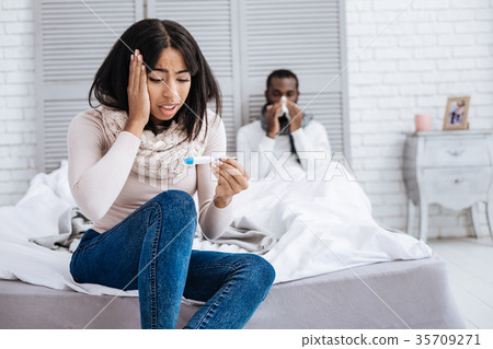 Astonished young woman not believing her eyes when Astonished young woman not believing her eyes when 35709271