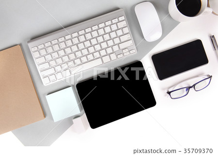 Office table with laptop tablet and mobile phone 35709370