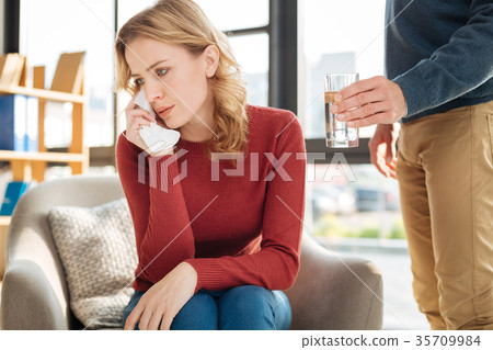 Moody young woman feeling sad 35709984