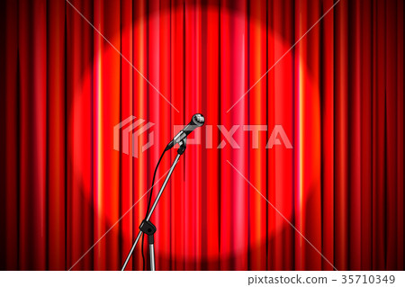 Red curtain with shiny microphone 35710349