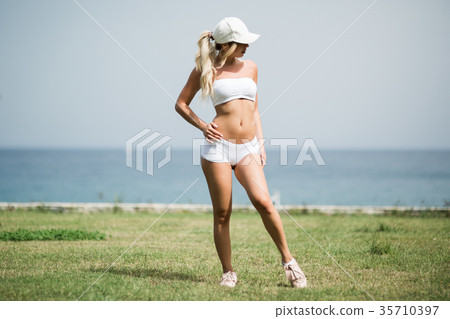 Full length side view portrait of a young sports Full length side view portrait of a young sports 35710397