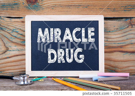 Miracle Drug. Health concept. Chalkboard on a wooden background Miracle Drug. Health concept. Chalkboard on a wooden background 35711505