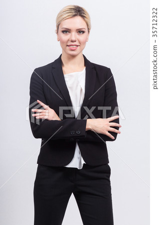 Attractive business lady in strong office jacket Attractive business lady in strong office jacket 35712322
