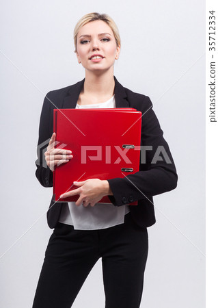 Attractive business lady in strong office jacket 35712334