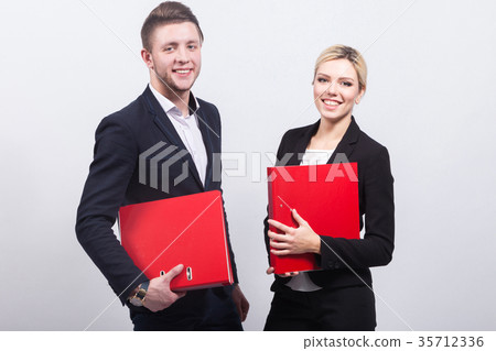 Picture of team of office workers with documents 35712336