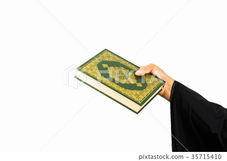 Koran in hand ,Quran in hand - holy book of Muslim 35715410