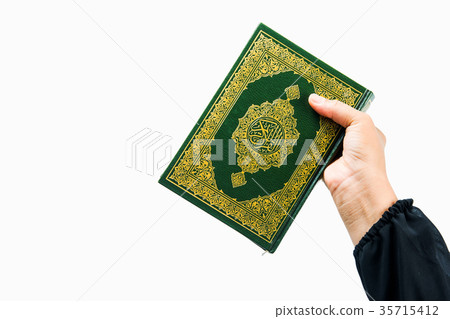 Koran in hand ,Quran in hand - holy book of Muslim 35715412