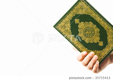 Koran in hand ,Quran in hand - holy book of Muslim 35715413