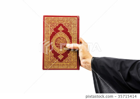 Koran in hand ,Quran in hand - holy book of Muslim 35715414