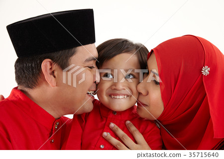 family in red baju raya family in red baju raya 35715640