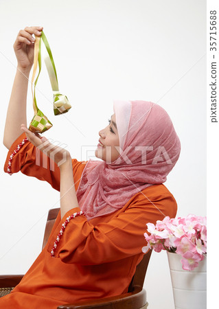 malay girl with tudung hoding ketupat 35715688