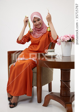 malay girl with tudung hoding ketupat 35715767