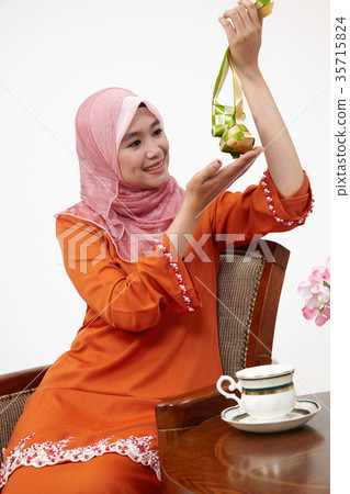 malay girl with tudung hoding ketupat 35715824