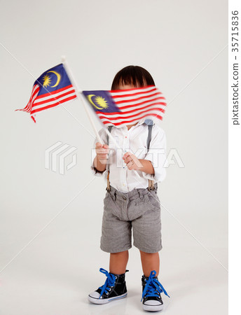 boy holding malaysia flag boy holding malaysia flag 35715836