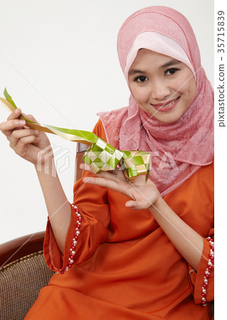 malay girl with tudung hoding ketupat 35715839