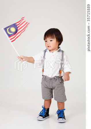 boy holding malaysia flag boy holding malaysia flag 35715889