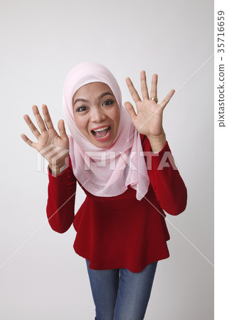 excited malay woman excited malay woman 35716659