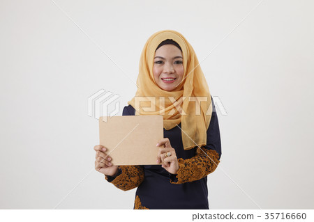 woman holding wooden board woman holding wooden board 35716660
