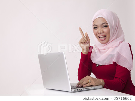 woman in front of the laptop woman in front of the laptop 35716662