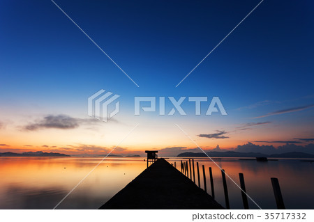 scenery view of old jetty to the sea sunrise scenery view of old jetty to the sea sunrise 35717332