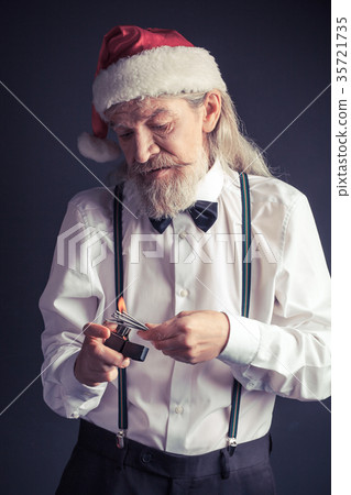 Office Santa setting fire for Bengal lights. 35721735