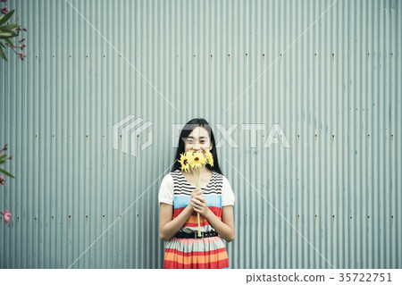 A woman with flowers 35722751