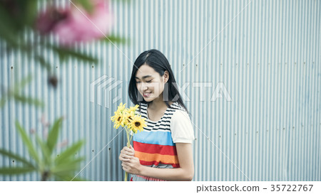A woman with flowers 35722767