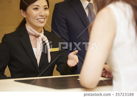 Woman working in a hotel reception 35723189
