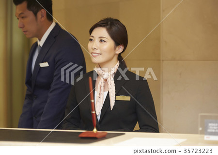 Woman working in a hotel reception Woman working in a hotel reception 35723223