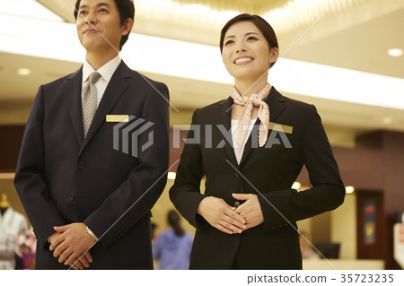 Men and women working in a hotel 35723235