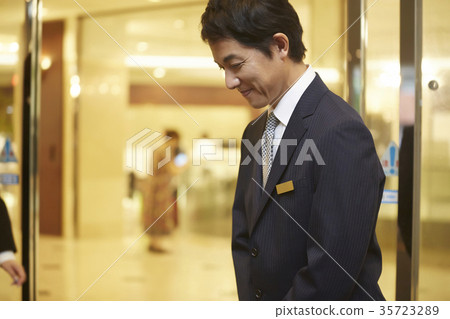 Men working at a hotel 35723289