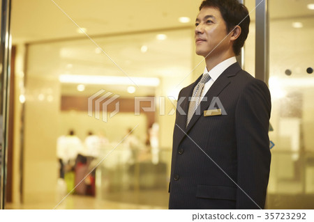 Men working at a hotel 35723292