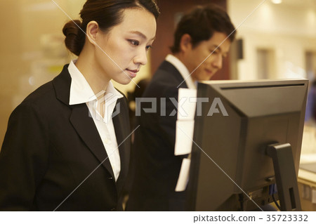 Woman working in a hotel reception Woman working in a hotel reception 35723332