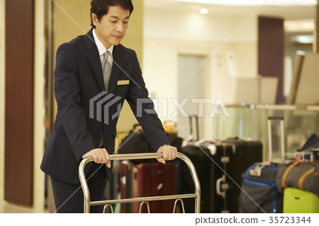 Men working at a hotel 35723344