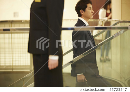 A man at a hotel A man at a hotel 35723347