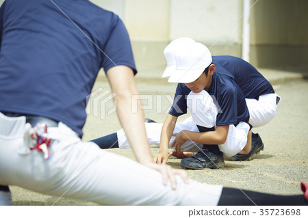 Boy baseball practice stretch preparation 35723698