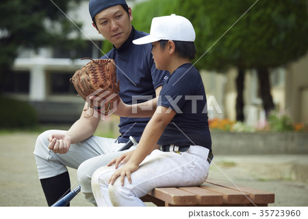 Boy baseball practice director and boy Boy baseball practice director and boy 35723960