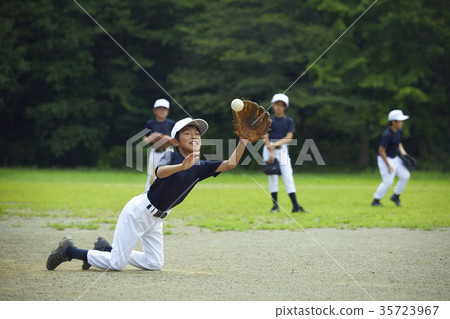 Boy baseball game boy catching ball 35723967
