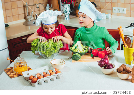 happy family funny kids are preparing the a fresh 35724498