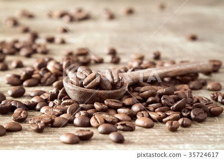 Wooden spoon with coffee beans Wooden spoon with coffee beans 35724617