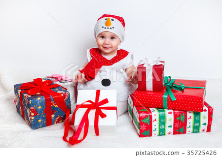 happy baby in snowman costume with christmas happy baby in snowman costume with christmas 35725426