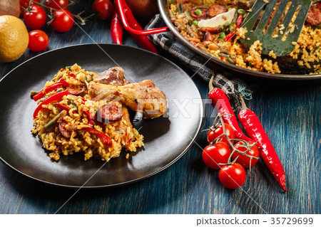 Traditional paella with chicken legs 35729699